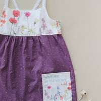 Handmade Girls' Wildflowers Dress with 'Love Her But Leave Her Wild' Quote Pocket | Shirred Back | Made in Maui, Hawaii