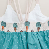 Back view of the hula dress showcasing the shirred elastic back for a comfortable, form-fitting look