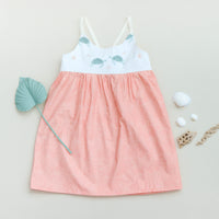 Dress with turtle design shown layed flat