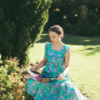 Handmade Girls Dress in Green Bougainvillea | A Mu'u House x Bitty Bambu Collaboration | Adjustable Tie Straps & Ruffled Hem | 100% Cotton | Made in Maui, Hawaii