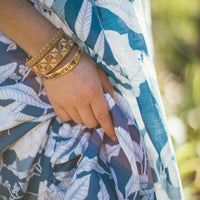 Handmade Girls Linen Floral Dress in Navy Gardenia | A Mu'u House x Bitty Bambu Collaboration | Adjustable Tie Straps & Twirling Skirt | Sizes 6M-8Y | Made in Maui, Hawaii
