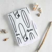 baby burp cloth in black and white with surfboards and aloha design by bitty bambu