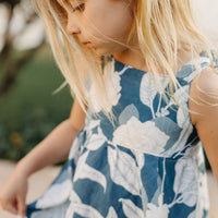 Handmade Girls Linen Floral Dress in Navy Gardenia | A Mu'u House x Bitty Bambu Collaboration | Adjustable Tie Straps & Twirling Skirt | Sizes 6M-8Y | Made in Maui, Hawaii