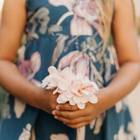 Close-up of the Navy Orchid floral print on 100% cotton poplin fabric