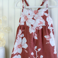 Handmade girls' Hau Flower dress with adjustable straps and shirred back, made from 100% cotton double gauze fabric