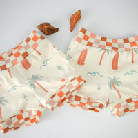 Eco- Friendly Organic Baby Shorts with Surf + Skate Print and Checkered Trim | Diaper Cover or Toddler Shorts | Handmade in Maui, Hawaii