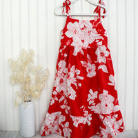 red tropical girls dress with flowers, adjustable straps and ruffled trim by bitty bambu