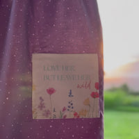 Handmade Girls' Wildflowers Dress with 'Love Her But Leave Her Wild' Quote Pocket | Shirred Back | Made in Maui, Hawaii