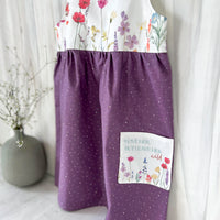 Handmade Girls' Wildflowers Dress with 'Love Her But Leave Her Wild' Quote Pocket | Shirred Back | Made in Maui, Hawaii
