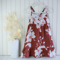 Handmade girls' Hau Flower dress with adjustable straps and shirred back, made from 100% cotton double gauze fabric