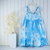 Handmade girls' hau flower dress with adjustable straps and shirred back, made from 100% cotton double gauze fabric