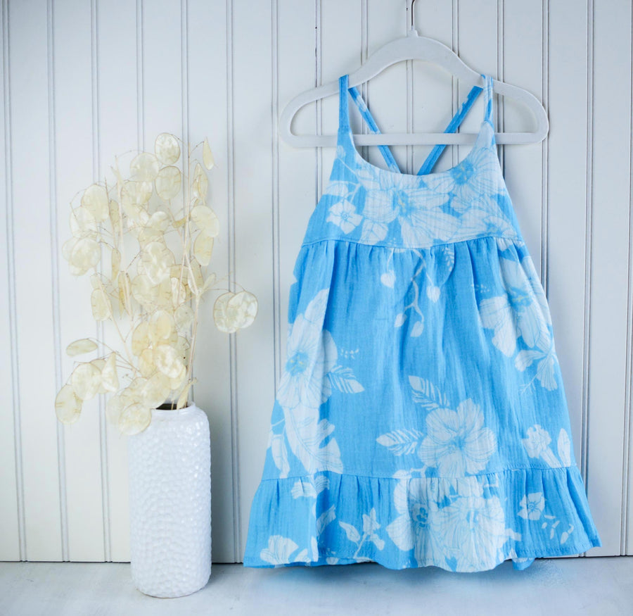 Handmade girls' hau flower dress with adjustable straps and shirred back, made from 100% cotton double gauze fabric