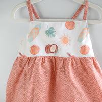 Handmade girls' 'Eternal Summer' dress with playful beachy print and shirred back, made from 100% cotton