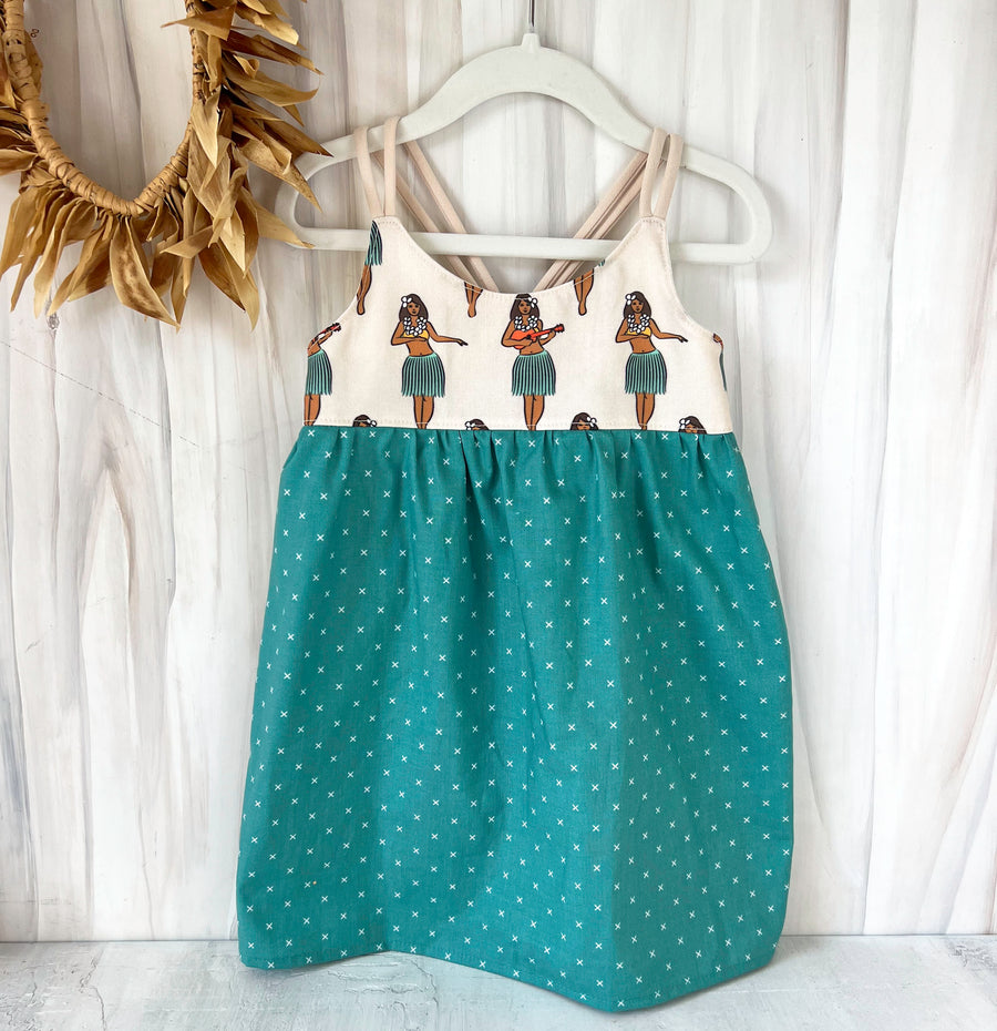 hula girls dress shown hanging featuring hula girl print by bitty bambu