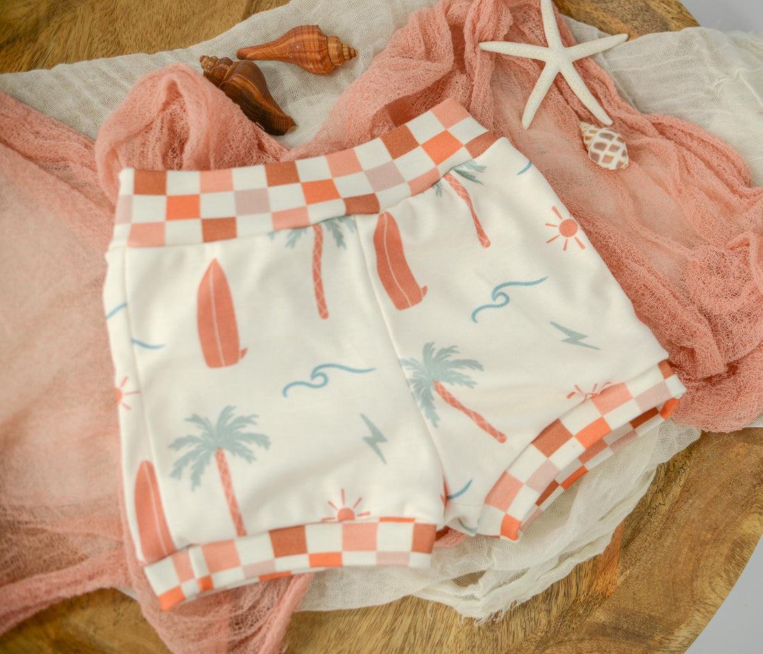 Eco- Friendly Organic Baby Shorts with Surf + Skate Print and Checkered Trim | Diaper Cover or Toddler Shorts | Handmade in Maui, Hawaii