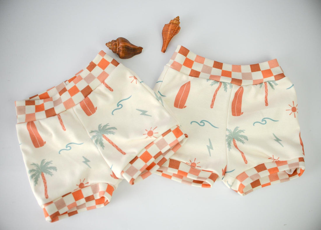 Eco- Friendly Organic Baby Shorts with Surf + Skate Print and Checkered Trim | Diaper Cover or Toddler Shorts | Handmade in Maui, Hawaii