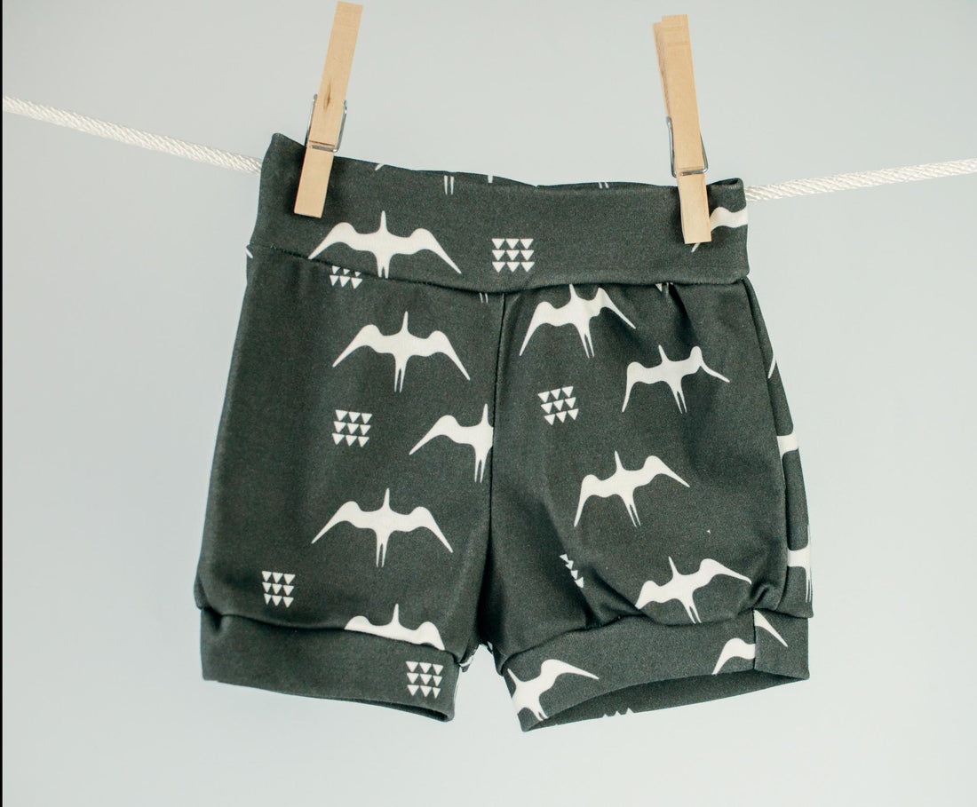 Organic Baby Shorts with Iwa Birds Print on Dark Gray | Gender Neutral Diaper Cover or Toddler Shorts | Handmade in Maui, Hawaii